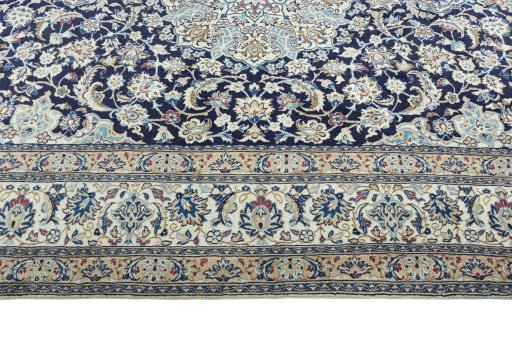 Corner detail of 2000s Nain rug showing border pattern and Wool pile