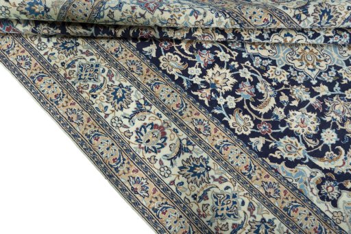 Close-up detail of 2000s Nain rug from Iran / Persia showing Wool weave