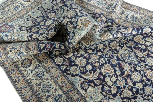 Surface texture of 2000s Nain rug with natural Wool and intricate pattern