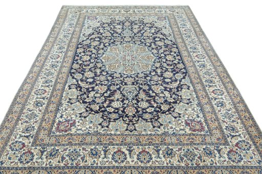 Surface texture of 2000s Nain rug with natural Wool and intricate pattern