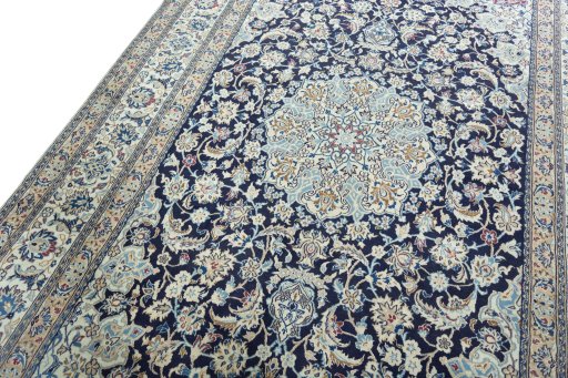 Backside of handmade 2000s Nain rug showing knot structure and weave density