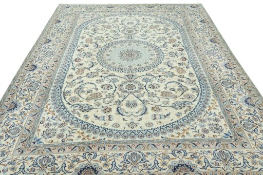 Surface texture of 2000s Nain rug with natural Wool and intricate pattern