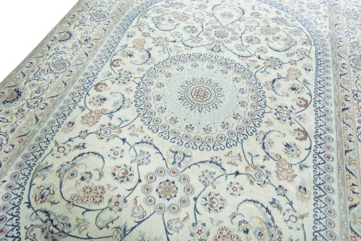 Backside of handmade 2000s Nain rug showing knot structure and weave density