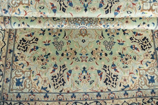 Close-up detail of 2000s Nain rug from Iran / Persia showing Wool weave