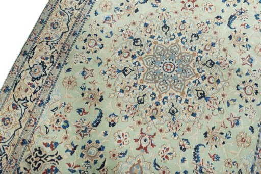 Backside of handmade 2000s Nain rug showing knot structure and weave density