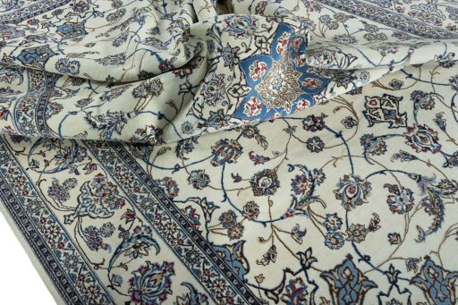 Backside of handmade 2000s Nain rug showing knot structure and weave density