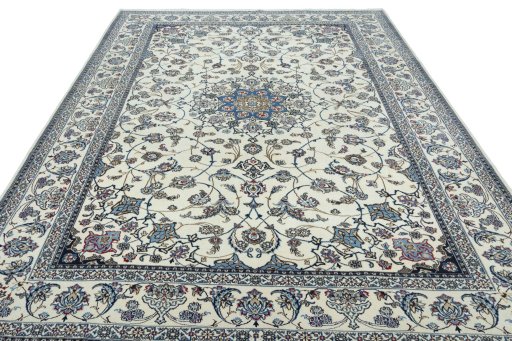 Backside of handmade 2000s Nain rug showing knot structure and weave density