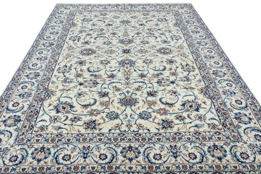 Surface texture of 2000s Nain rug with natural Wool and intricate pattern