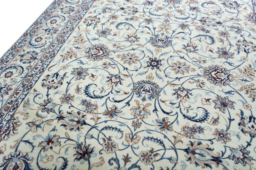 Backside of handmade 2000s Nain rug showing knot structure and weave density