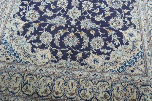 Close-up detail of 2000s Nain rug from Iran / Persia showing Wool weave