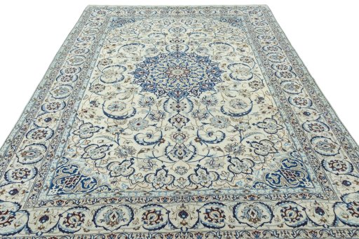 Surface texture of 2000s Nain rug with natural Wool and intricate pattern