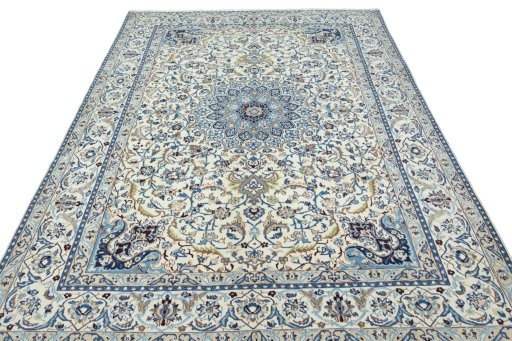 Surface texture of 2000s Nain rug with natural Wool and intricate pattern