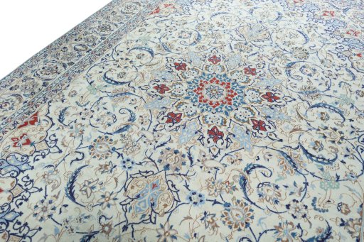 Backside of handmade 2000s Nain rug showing knot structure and weave density