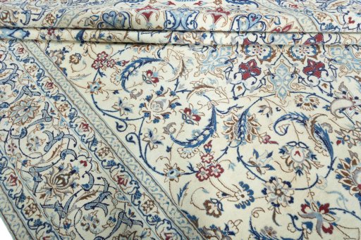 Close-up detail of 2000s Nain rug from Iran / Persia showing Wool weave
