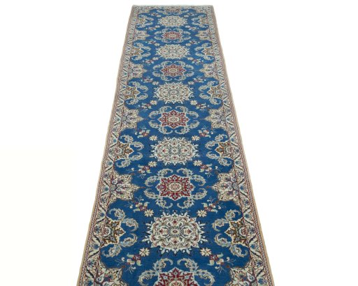 Surface texture of 2000s Nain rug with natural Wool and intricate pattern