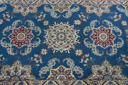 Central medallion detail of 2000s Nain rug from Iran / Persia