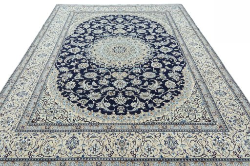 Surface texture of 2000s Nain rug with natural Wool and intricate pattern