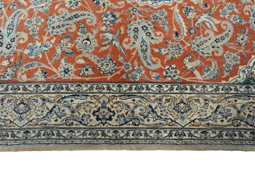 Corner detail of 1970s Nain rug showing border pattern and Cork pile
