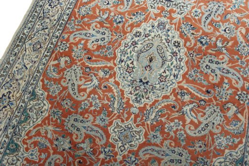 Backside of handmade 1970s Nain rug showing knot structure and weave density
