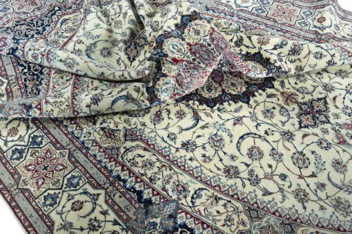 Surface texture of 2000s Nain rug with natural Cork and intricate pattern