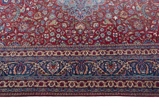 Corner detail of 1930s Nain rug showing border pattern and Wool pile
