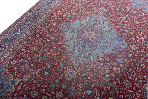 Backside of handmade 1930s Nain rug showing knot structure and weave density