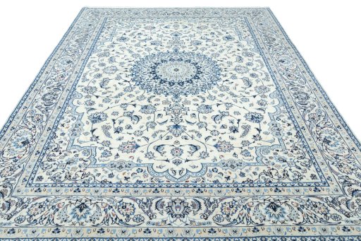 Surface texture of 2000s Nain rug with natural Wool and intricate pattern