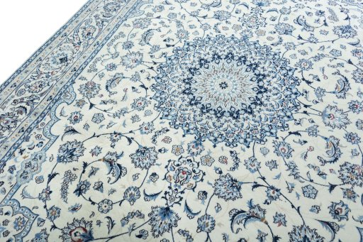 Backside of handmade 2000s Nain rug showing knot structure and weave density