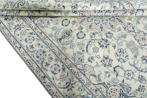 Close-up detail of 2000s Nain rug from Iran / Persia showing Wool weave