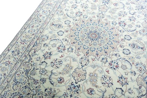 Backside of handmade 2000s Nain rug showing knot structure and weave density