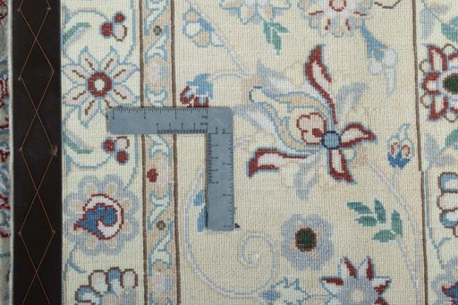 Backside of handmade 2000s Nain rug showing knot structure and weave density