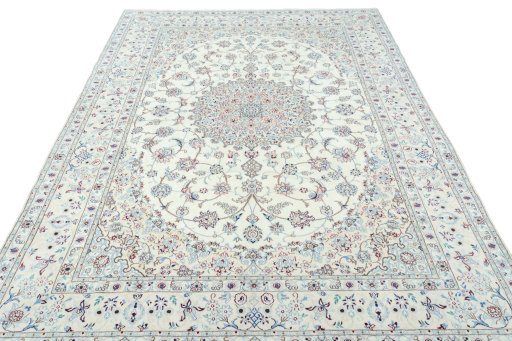 Surface texture of 2000s Nain rug with natural Wool and intricate pattern