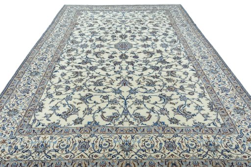 Surface texture of 2000s Nain rug with natural Wool and intricate pattern