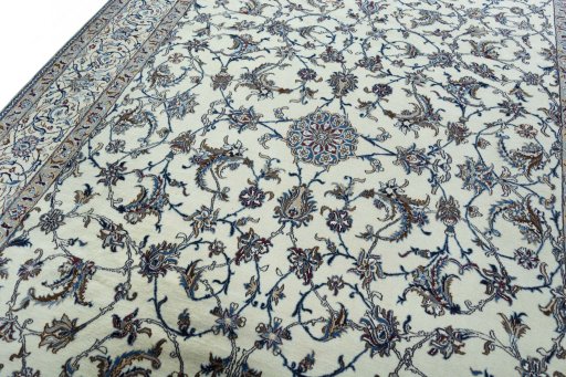 Backside of handmade 2000s Nain rug showing knot structure and weave density
