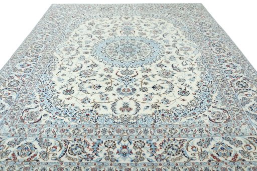 Surface texture of 2000s Nain rug with natural Wool and intricate pattern