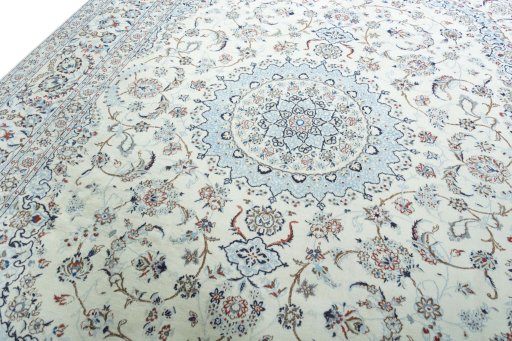 Backside of handmade 2000s Nain rug showing knot structure and weave density