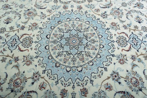 Central medallion detail of 2000s Nain rug from Iran / Persia