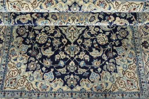 Close-up detail of 2000s Nain rug from Iran / Persia showing Wool weave