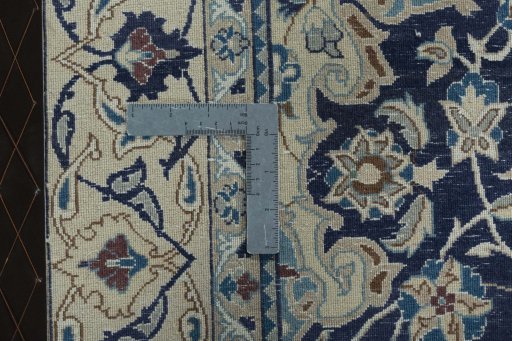 Backside of handmade 2000s Nain rug showing knot structure and weave density