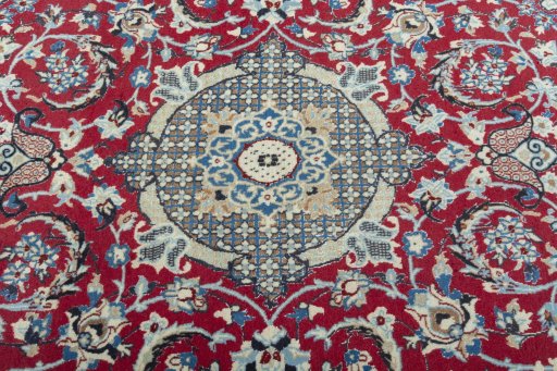 Central medallion detail of 2000s Nain rug from Iran / Persia