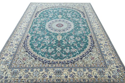 Surface texture of 1970s Nain rug with natural Wool and intricate pattern