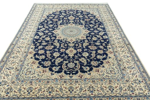 Surface texture of 1970s Nain rug with natural Wool and intricate pattern