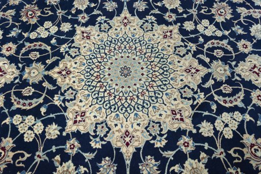 Central medallion detail of 1970s Nain rug from Iran / Persia