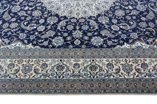 Corner detail of 1970s Nain rug showing border pattern and Cork pile