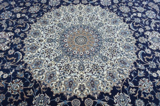 Central medallion detail of 1970s Nain rug from Iran / Persia