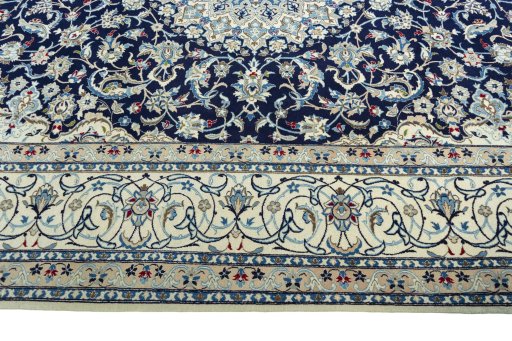 Corner detail of 1970s Nain rug showing border pattern and Cork pile