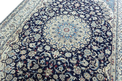 Backside of handmade 1970s Nain rug showing knot structure and weave density