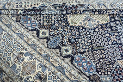 Surface texture of 1970s Nain rug with natural Wool and intricate pattern