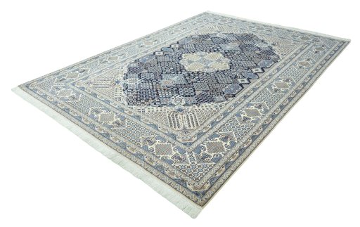Corner detail of 1970s Nain rug showing border pattern and Wool pile