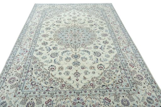 Surface texture of 2000s Nain rug with natural Wool and intricate pattern